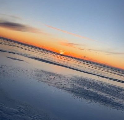 A beautiful frozen lake in Minnesota during the winter.