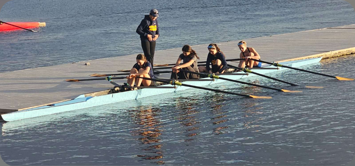 Novice Quad prepares for their race.  PHOTO BY MEGAN MCDEVIT