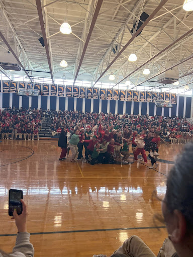 Teachers and students pose after a skit 