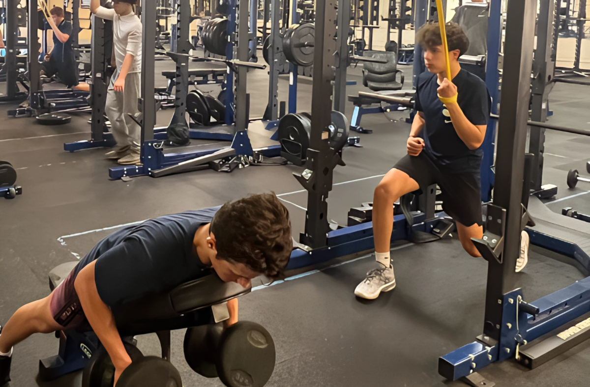 Joseph Virginio and Derek Brown train in the STA weight room to get in shape for the season. (Photo by Joe Virginio)