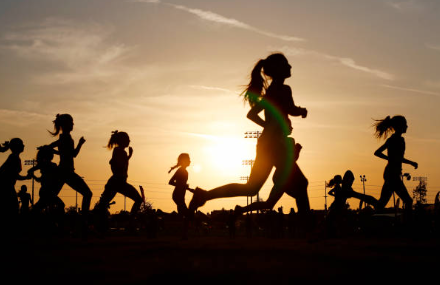 Girls running in a race, one of the events of Cailini. (Photo courtesy of Getty Images)
