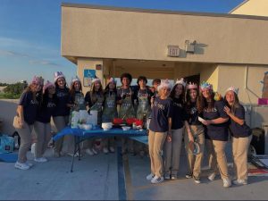 The students making pancakes on the top of the parking garage