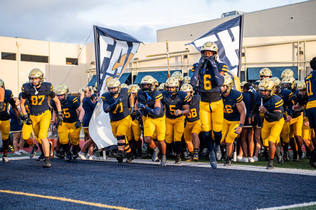 Raiders enter the stadium, ready to battle!