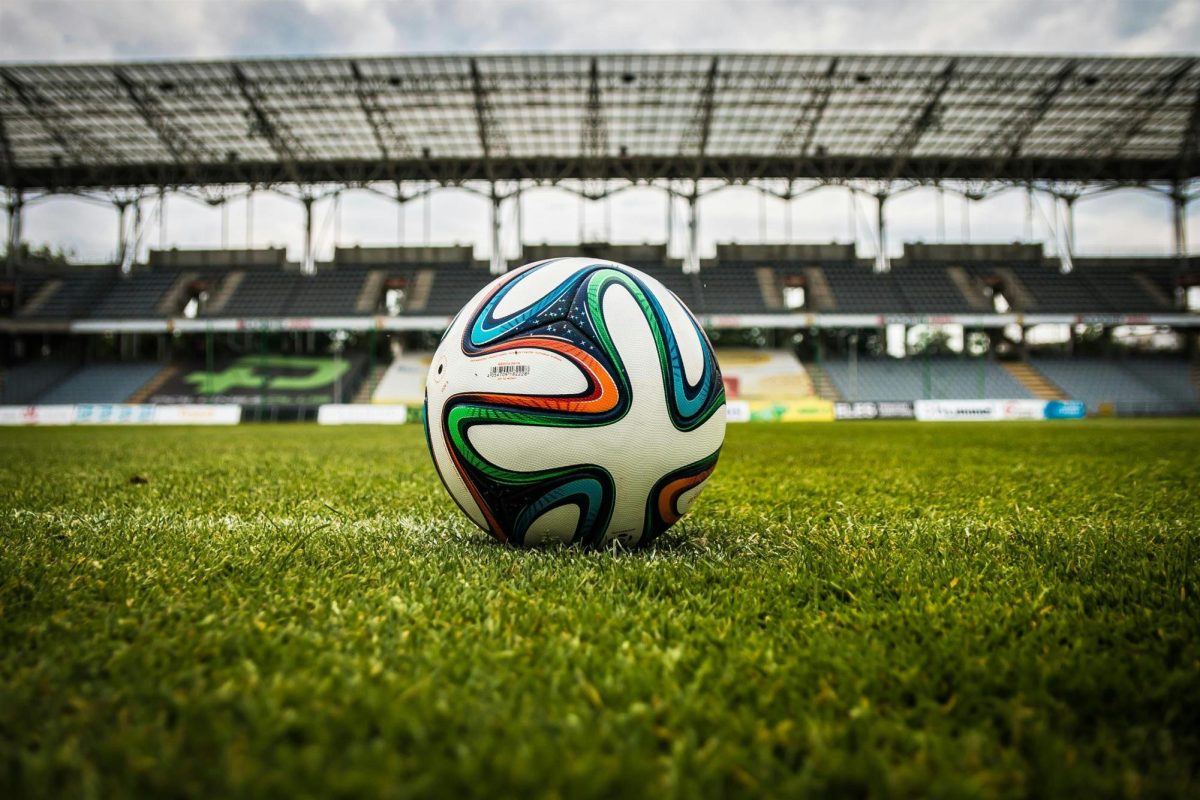 Soccer ball on pitch.