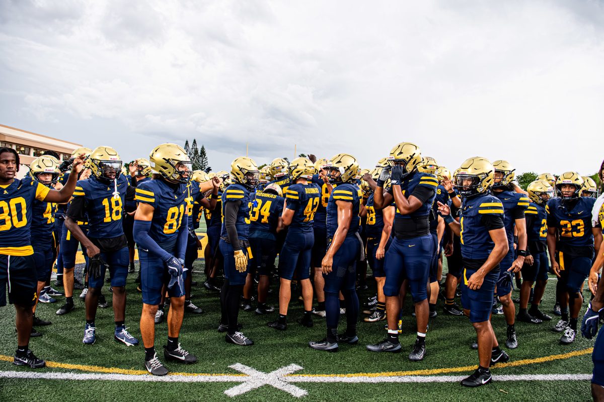 Aquinas Raiders prepare to take on the Boyd Anderson Cobras at the Brian Piccolo Stadium.