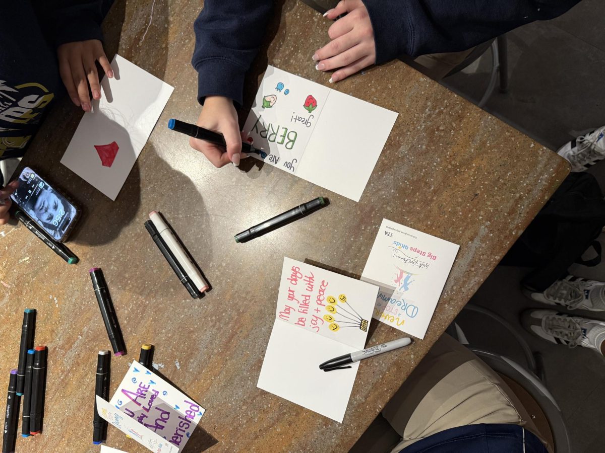Student cards help to brighten the day of those in need of cheer.
