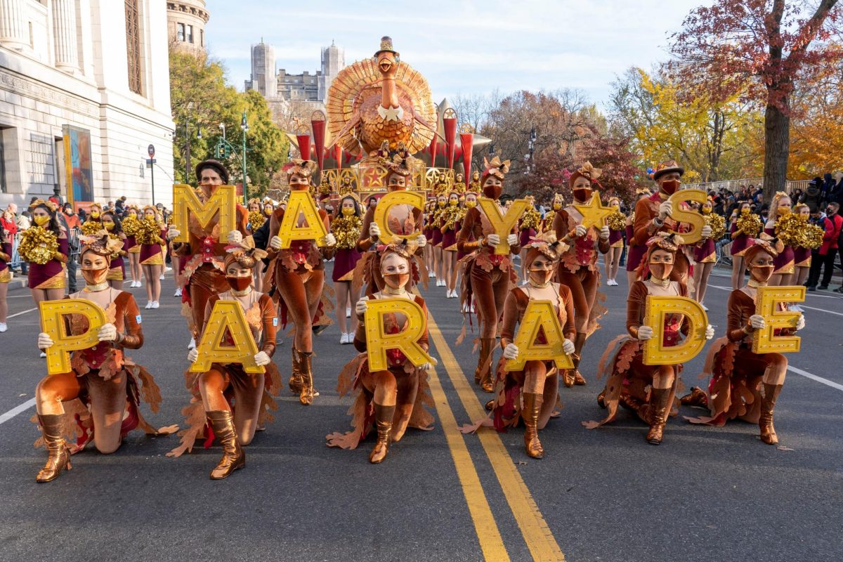 Dancers pose for a picture ahead of the 95th Annual Macy's Thanksgiving Day Parade on November 25, 2021 in New York City. 

Image Courtesy of Shutterstock