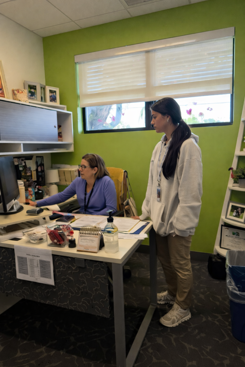 Guidance Counselor, Michelle Kupper, reviews course selection options with a student.