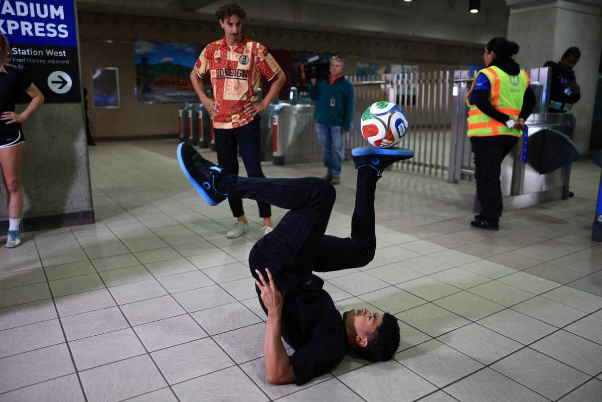 Freestyle soccer performer Umar Daliti entertains travelers as LA Metro launches contactless credit and debit card fare payment and the LA Metro mobile app ahead of the FIFA World Cup, at Union Station in Los Angeles, California, U.S., May 28, 2026. REUTERS/David Swanson