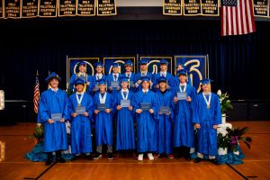 Members of the Varsity Baseball Team attended a special graduation ceremony since their Championship game interfered with the official graduation date.